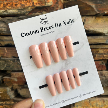 Handmade peach press on nails on display card